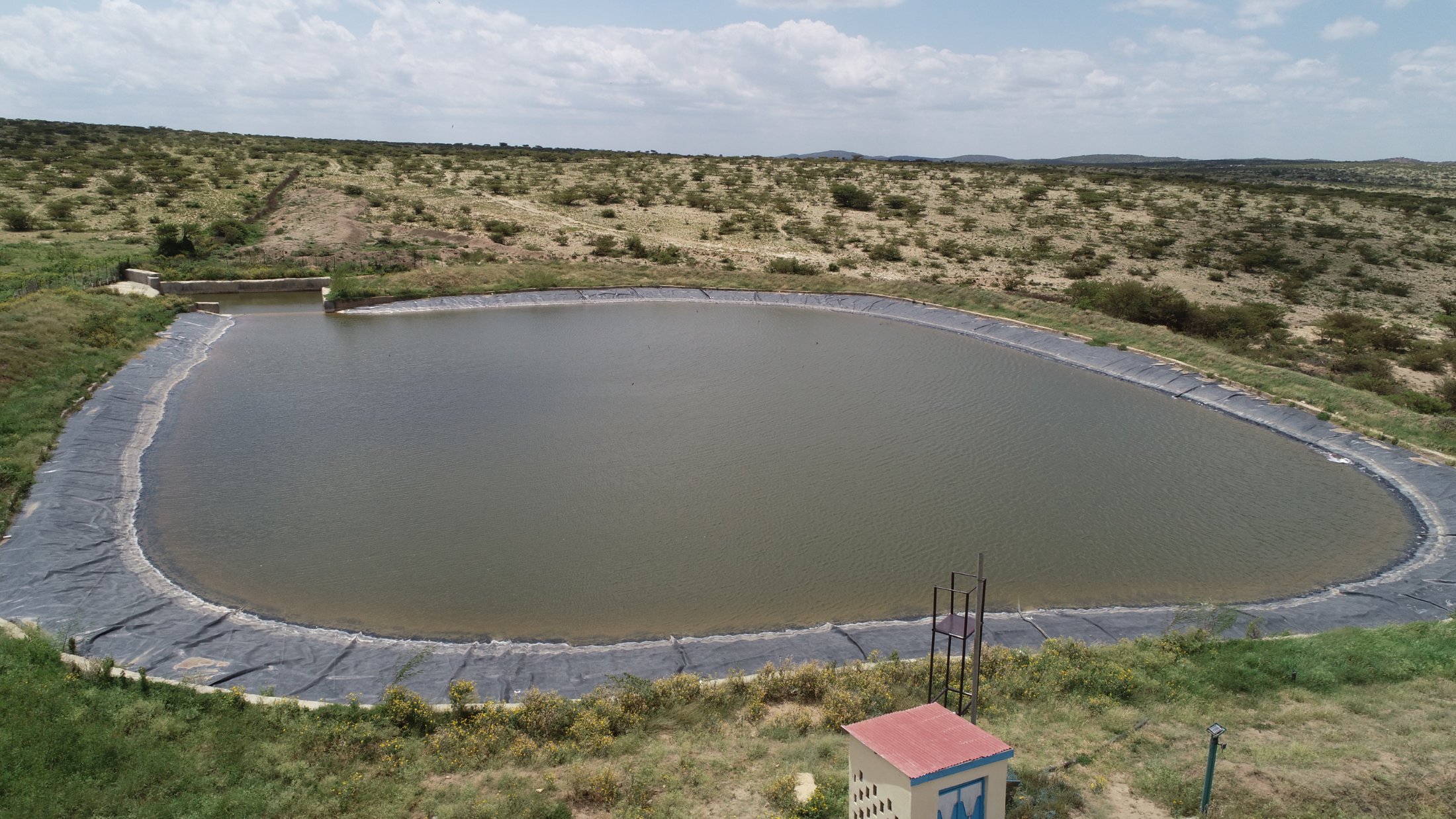 Lined hafir dam holding seasonal runoff, Somaliland.